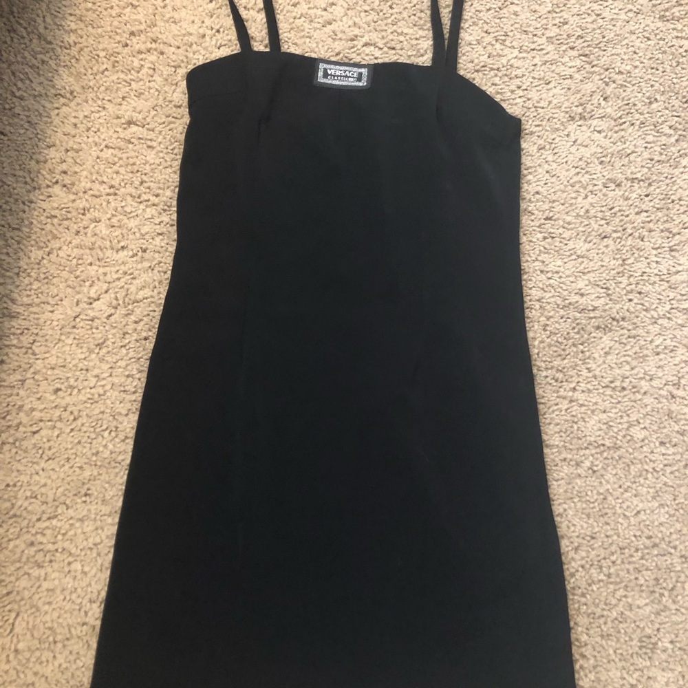 Versace black dress slight distressing on hem